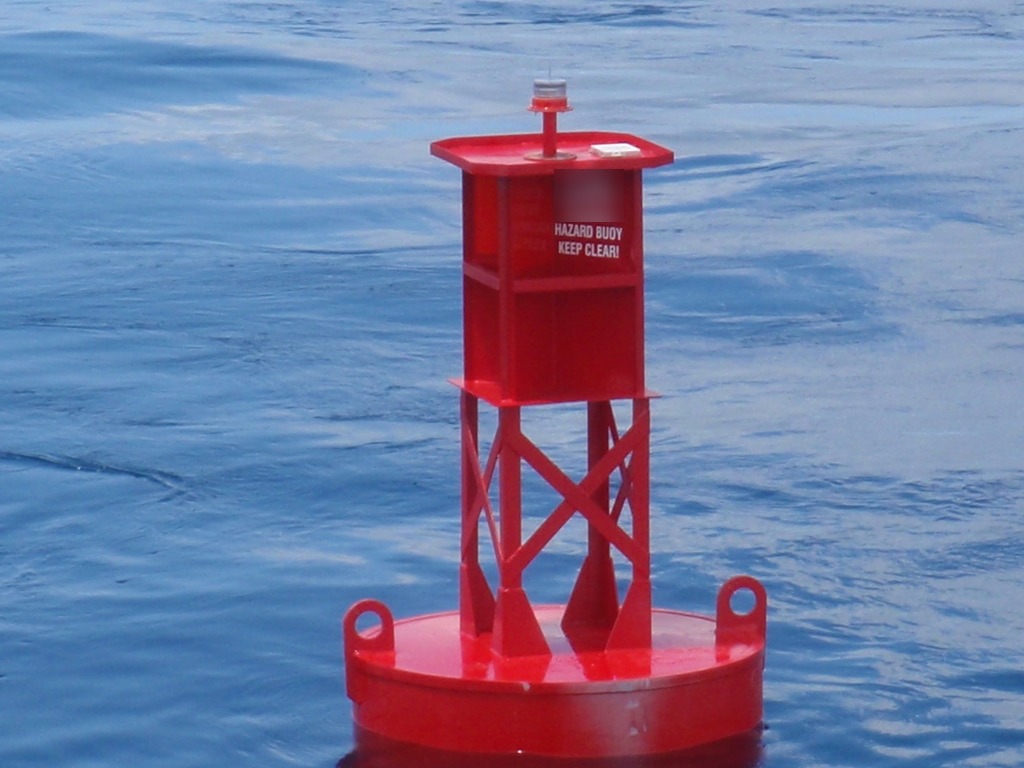 BL 620 6 ft x 20 ft steel hazard marker buoy with LED lantern and built-in radar reflector on station offshore